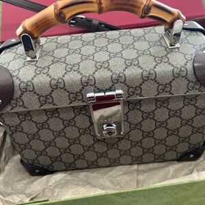 GUCCI Authentic Monogram Globetrotter Handbag.